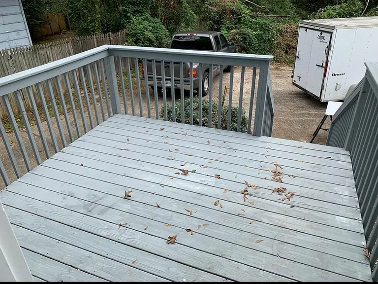 back deck and parking pad. Bring your grill!!