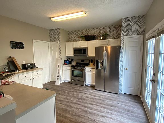 The popcorn ceiling will be removed before September 15th.