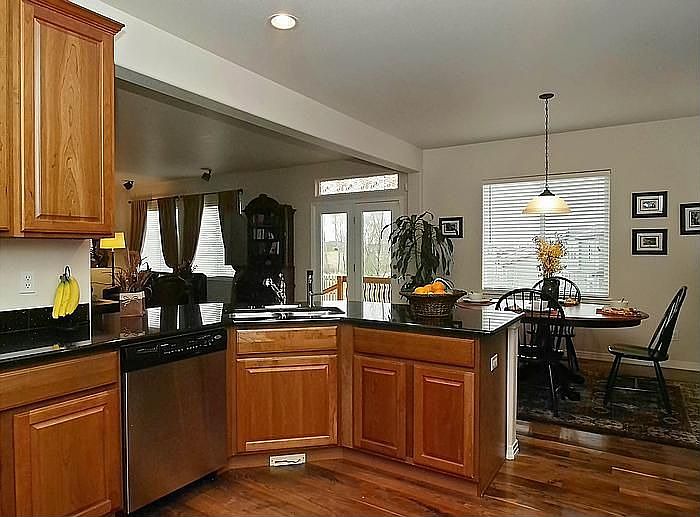 42" Cabinets, Walnut Floors, Slab Granite & Stainless Appliances