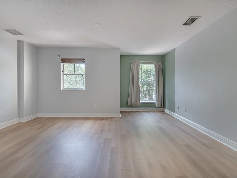 The large primary bedroom has plenty of space for a desk or reading nook!