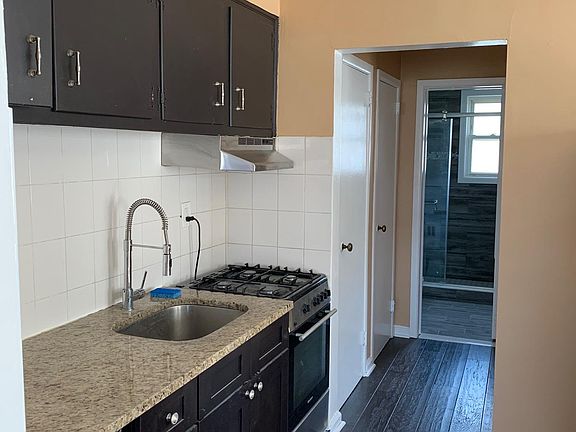 Stainless steel appliance (gas stove, sink, dishwasher) and granite counter tops. Lots of cabinet space.