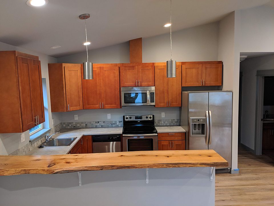 Spacious kitchen with ss appliances