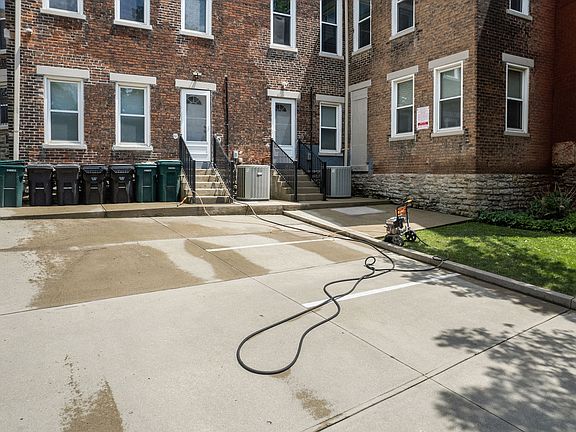 Back of home with two parking spaces for 2225 Ohio Ave
