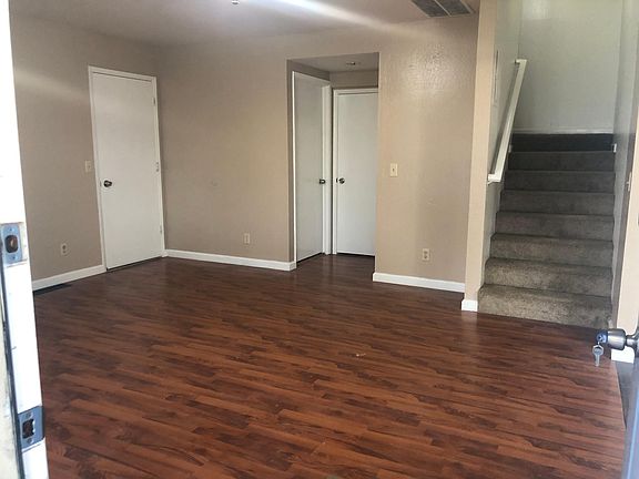 Living Room with entry door to attached garage