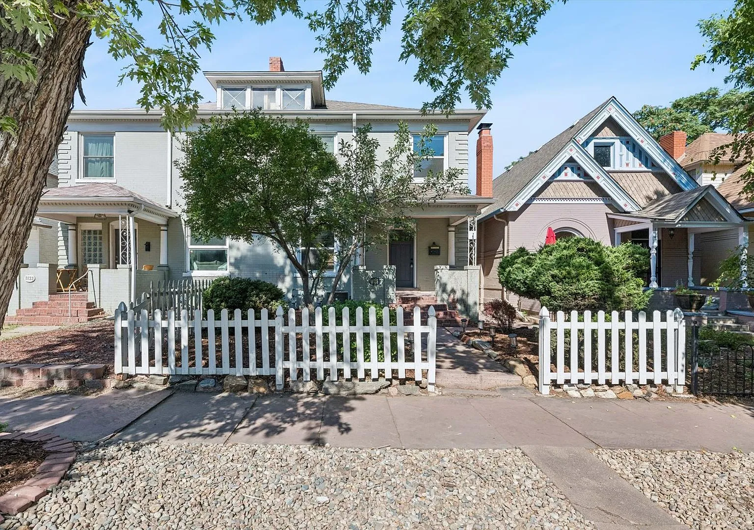 Historic Denver Charm Meets Modern Comfort | 4BR/2BA Townhouse with Off-Street Parking! — Photo 1