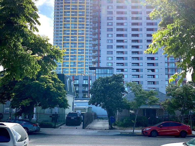 One block from newly constructed condo buildings