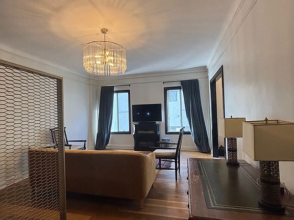 Living / bed area with workstation desk