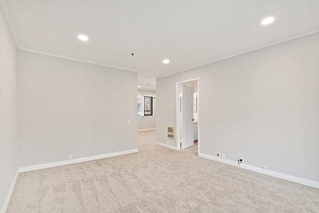 living room looking toward dinning area and door to bedroom