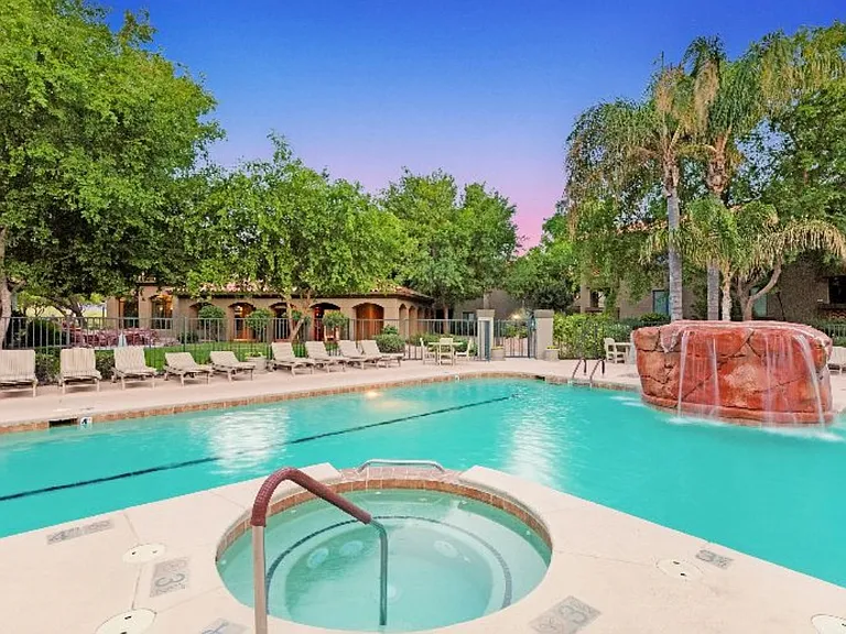 COMPLEX AMENITIES - Enjoy two pools with waterfalls, jacuzzi, showers, restrooms, outdoor fireplace, community center