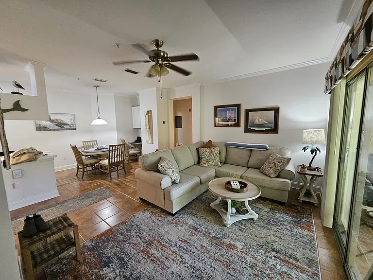 Living room with dining table and desk area