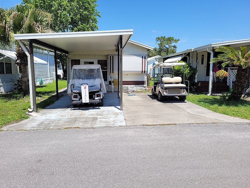 Front entrance with carport