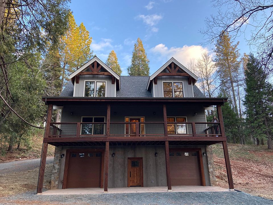 Exterior of three level home. Ground level has since been updated into a recreation room, bedroom, bathroom.