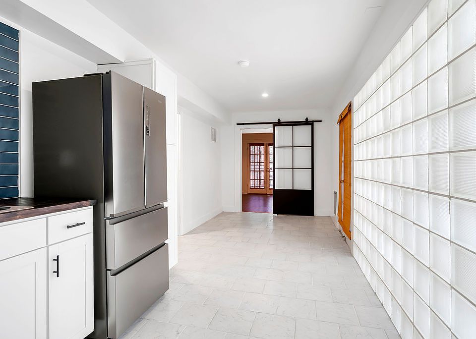 Kitchen looking towards dining room and entry.