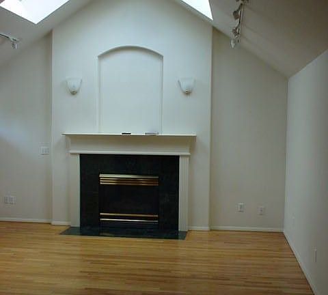 High vaulted ceilings in main living room add light throughout the day.