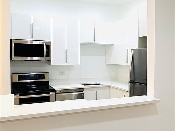 2nd image of 9628 S Belfort Cir #203