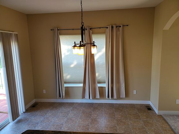 Dining Area with a slider to the deck.