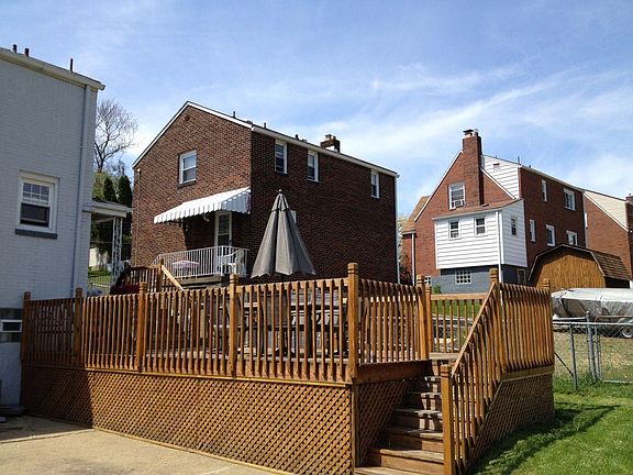 Extra large deck off of the kitchen/side porch. 