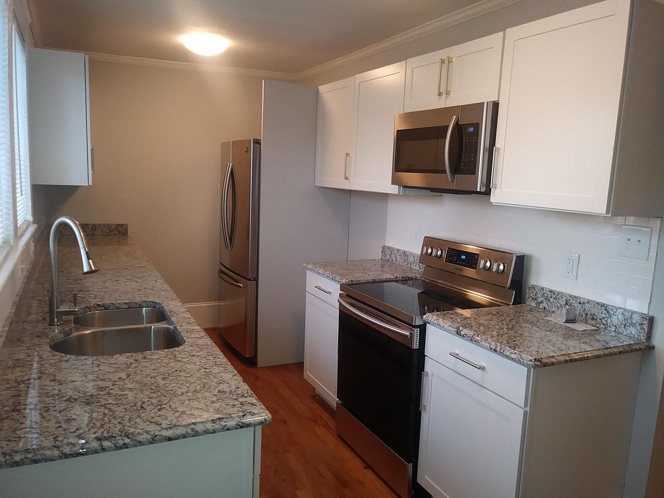 New granite, appliances, hardwood floor and new cabinets