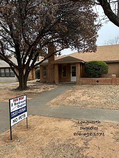Front view of duplex (rear entry garage)