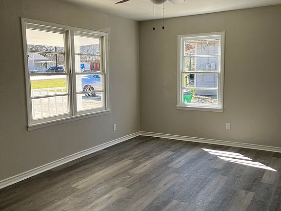Living Room. Windows have mini-blinds