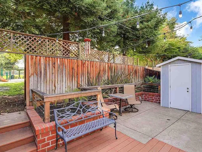 Backyard with direct access to park + storage shed