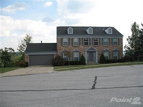 This home sits in the cul de sac and has great curb appeal.  The view from the back deck is amazing!