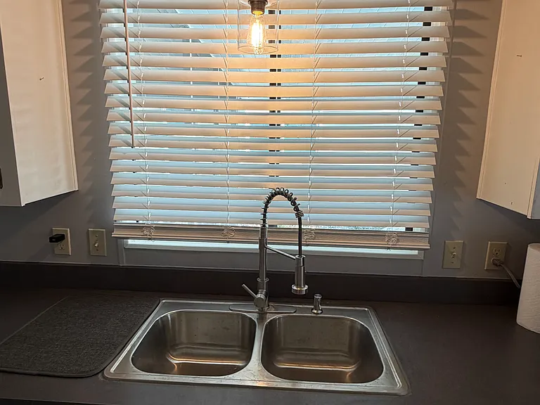 deep sink with chefs faucet and garbage disposal