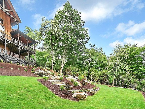 Tiered yard.. Bocce/playset?