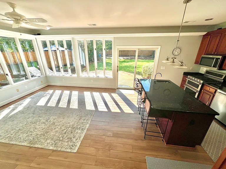 Family Room and Kitchen, overlooks the backyard. Newly installed Andersen double door for entry/exit