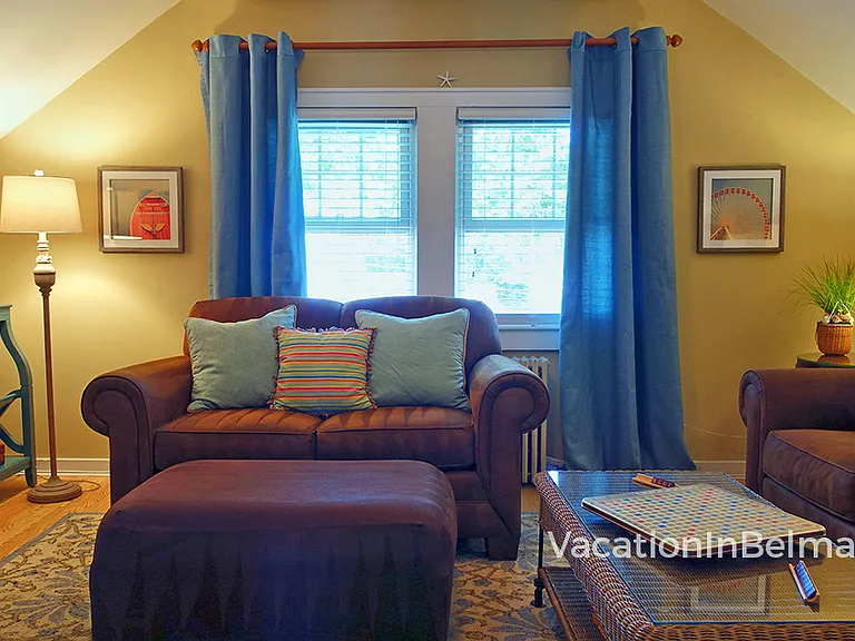 Living room is comfortably furnished for reading, watching TV, and relaxing.