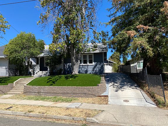 Front View + Long Driveway