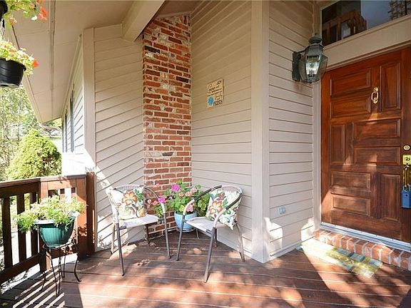 Enjoy your morning coffee on this beautiful, private, front porch.