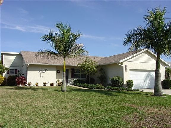 Beautiful Canal Front Home With ALL NEW Windows & 3 Year New Roof