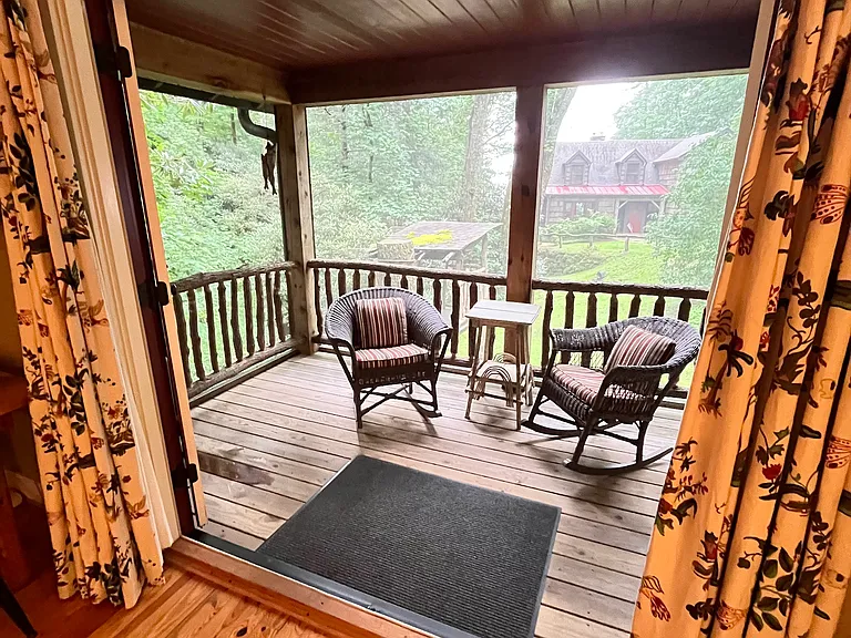 You'll love being able to open the double French doors to enjoy indoor/outdoor living on your private screen porch!