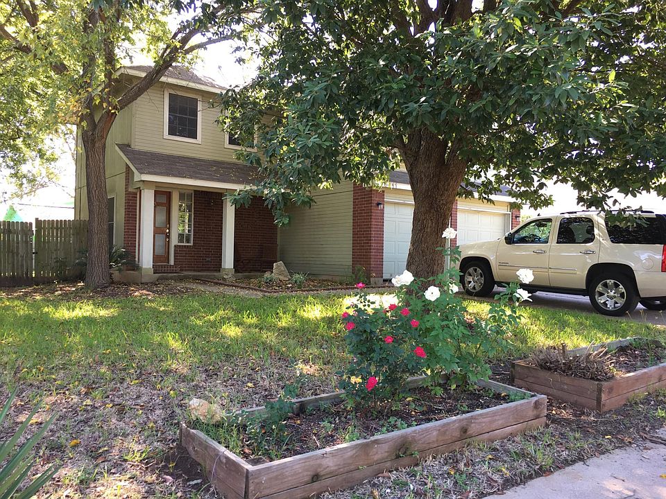 House front yard with built in flower planters