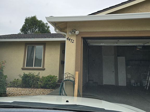 2 car garage and new roof and gutters