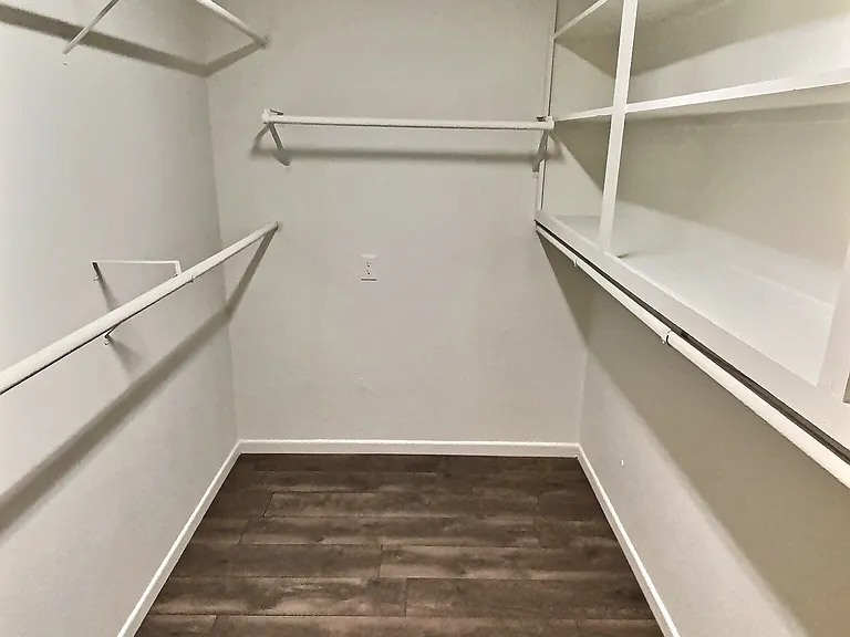 Walk in closet in Primary bedroom