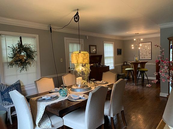 Dining room and den off the kitchen provide a large secondary entertainment area