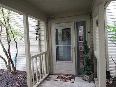 Exterior Front. You ll find your front door beneath a covered porch, just up the sidewalk to the right of the garage.