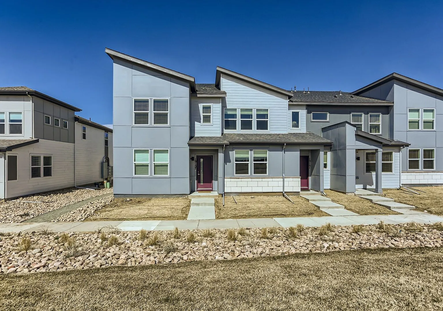 Modern Comfort Minutes from DIA 3BR Townhome with Upgrades Throughout! — Photo 1