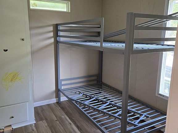 Bed room 1. Picture taken from the Jack-n-Jill bathroom that the 2 bedrooms share.