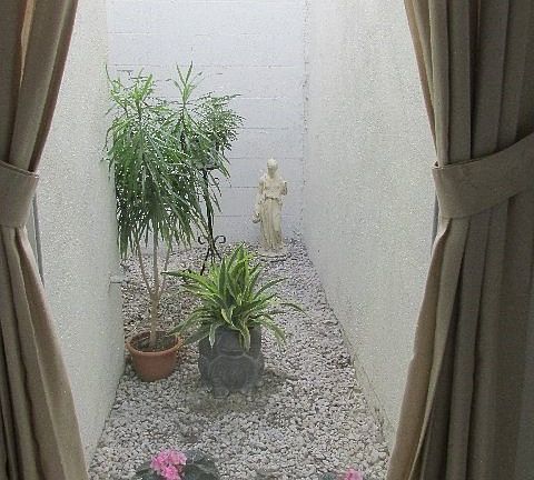 The Atrium lets lots of natural light in and is a great area for the homeowner to enjoy growing plants ... or I have seen this area remodeled into an office space, or walk-in closet.