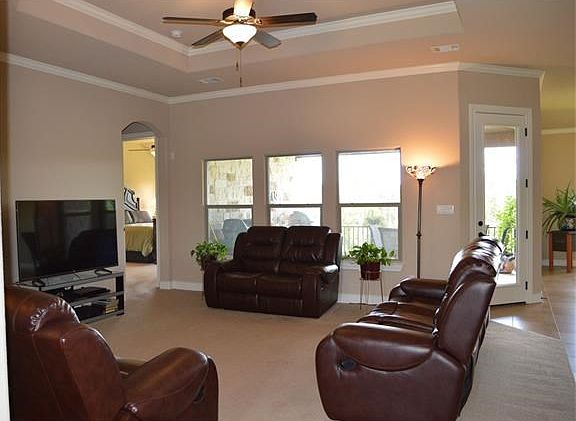 OPEN floorplan, with more crown molding, & views
