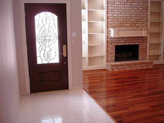 Plantation shutters and real hardwood floors abound all over house.