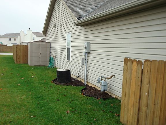 Side view, with storage shed