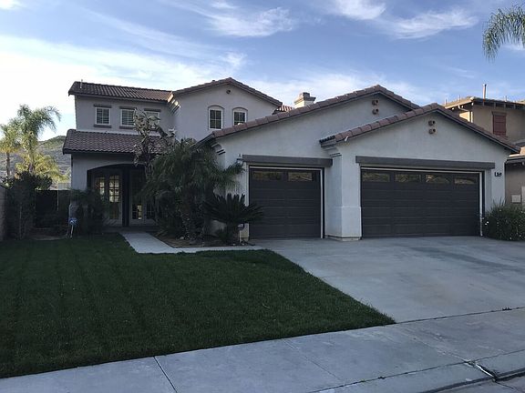LOVELY HOME WITH 3 CAR GARAG