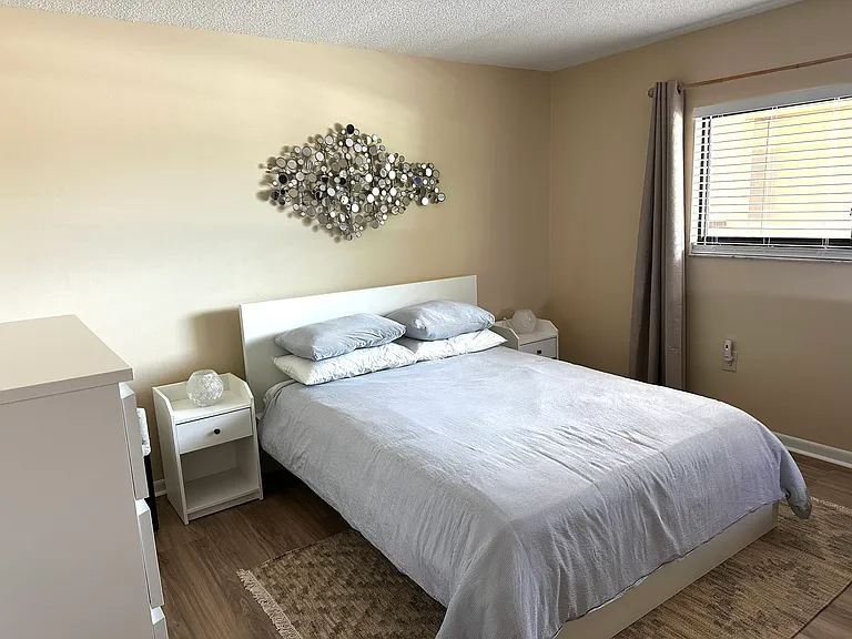 second bedroom with queen bed