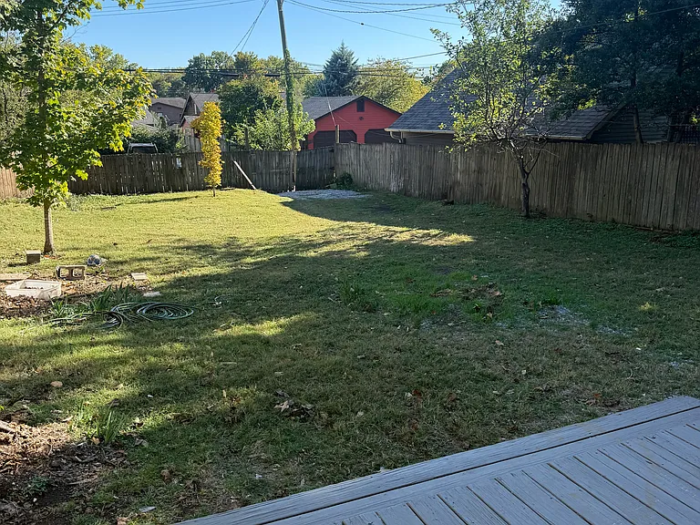 Large backyard and deck off kitchen