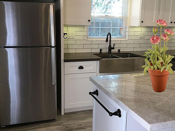 Kitchen, view toward the sink and window