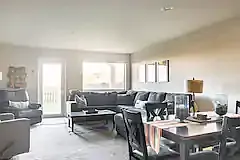 Spacious living room and dining with plenty of comfortable furniture